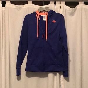 Zip up North Face hoodie.